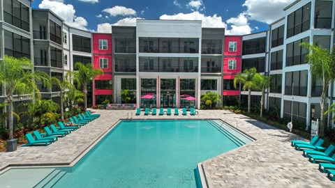 a swimming pool in front of an apartment building at Pinnacle Apartments, Jacksonville, 32256